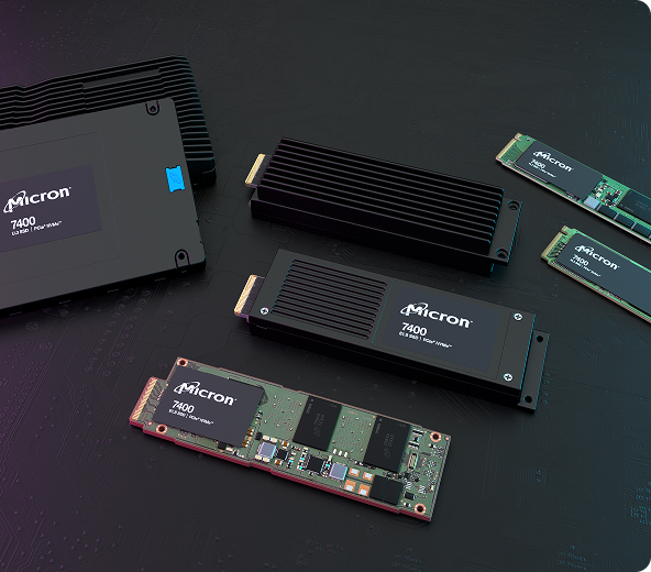 All variations of the Micron 7400 SSD spaced out and arranged on a dark, circuitry-style surface.