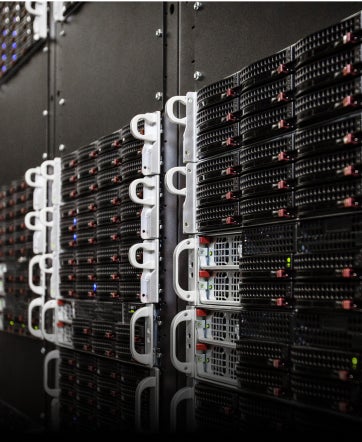 A row of black server racks.