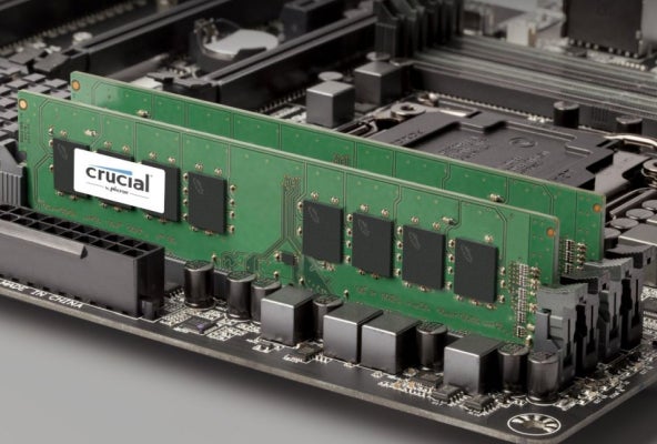 Two Crucial RAM modules installed on a motherboard.